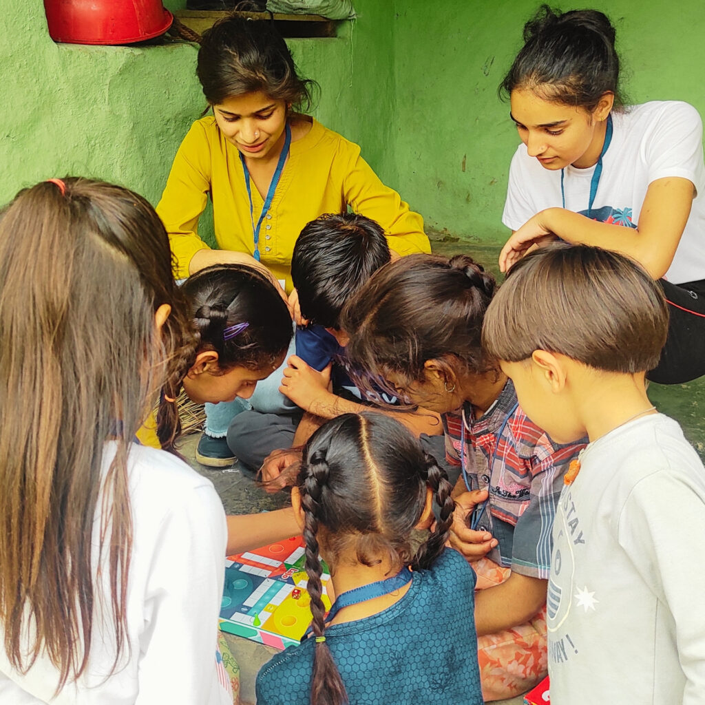 Community leaders engaging children of Rakkar village in games activity