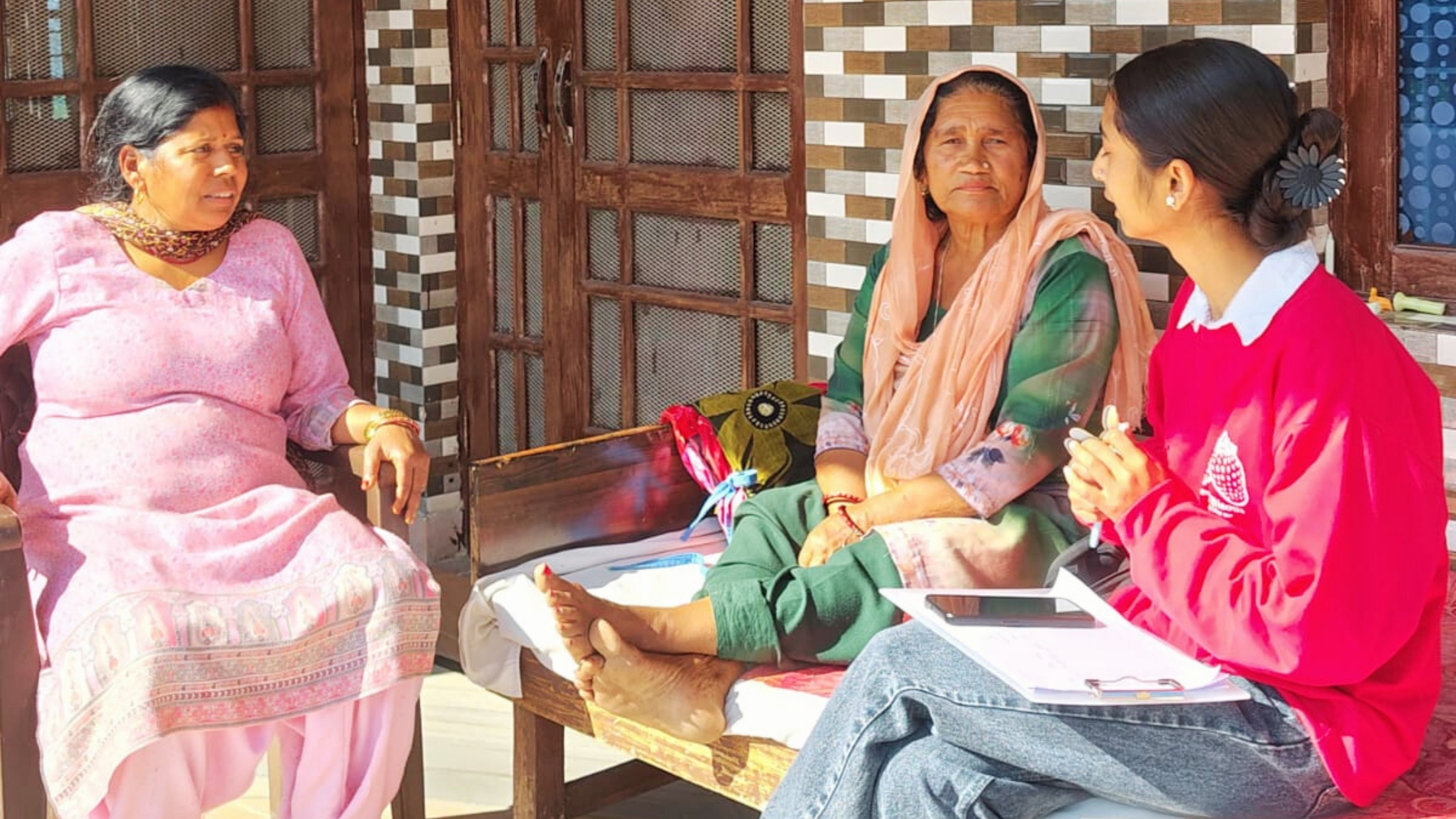 EIF team conducting women, household and community well-being survey